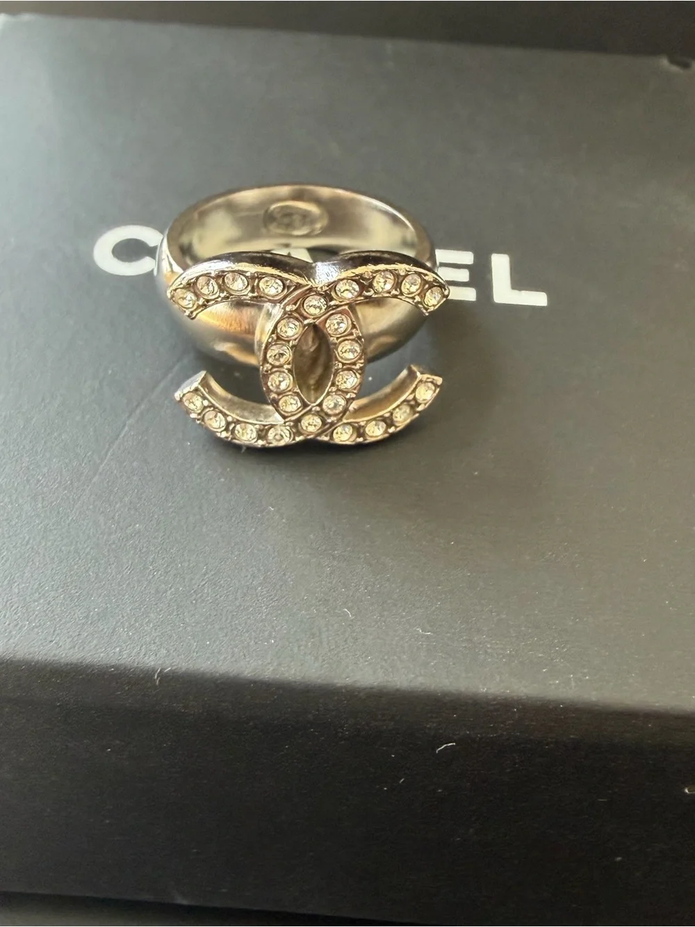 CHANEL ring showcasing